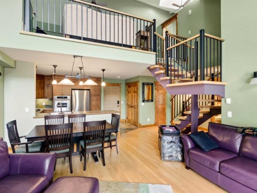 307-155 Crossbow Place, Canmore, AB - Indoor Photo Showing Living Room