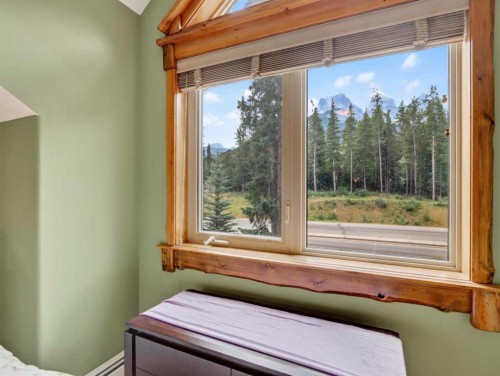 307-155 Crossbow Place, Canmore, AB - Indoor Photo Showing Bedroom