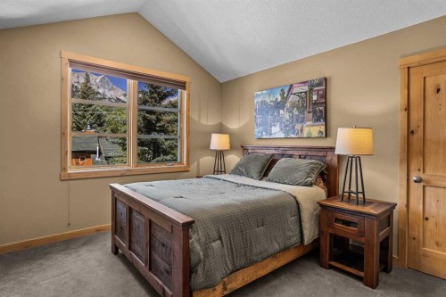 516 8Th Avenue, Canmore, AB - Indoor Photo Showing Bedroom