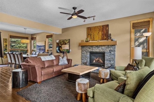 516 8Th Avenue, Canmore, AB - Indoor Photo Showing Living Room With Fireplace