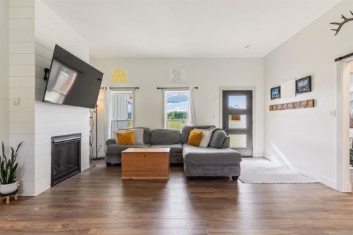5406 Poplar Lane, Athabasca, AB - Indoor Photo Showing Living Room With Fireplace