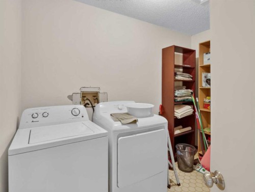 22 Pinewood Crescent, Canmore, AB - Indoor Photo Showing Laundry Room