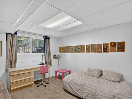 22 Pinewood Crescent, Canmore, AB - Indoor Photo Showing Bedroom
