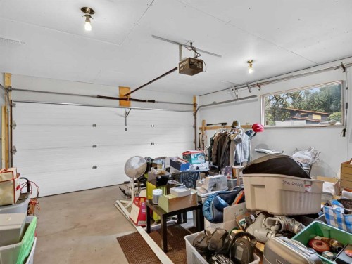 22 Pinewood Crescent, Canmore, AB - Indoor Photo Showing Garage