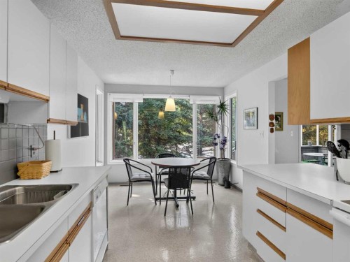22 Pinewood Crescent, Canmore, AB - Indoor Photo Showing Kitchen With Double Sink