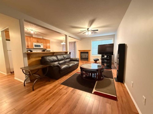 103-501 3 Street, Fox Creek, AB - Indoor Photo Showing Living Room With Fireplace