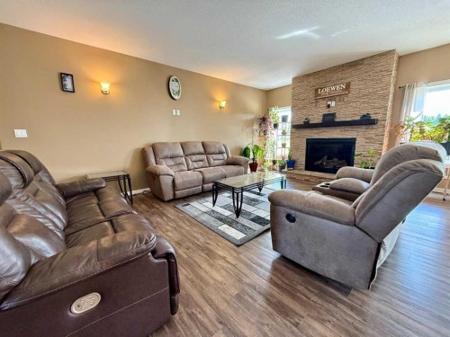 115017 Twp Rd 600A, Rural Woodlands County, AB - Indoor Photo Showing Living Room With Fireplace