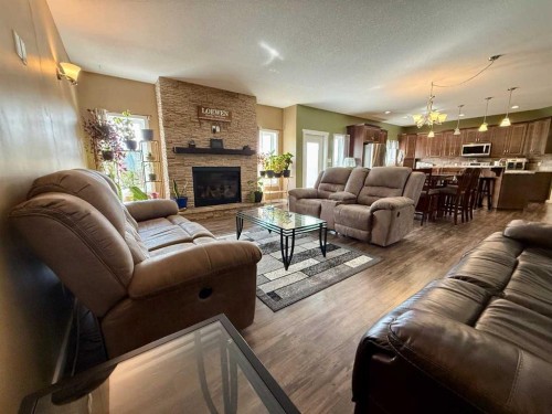 115017 Twp Rd 600A, Rural Woodlands County, AB - Indoor Photo Showing Living Room With Fireplace