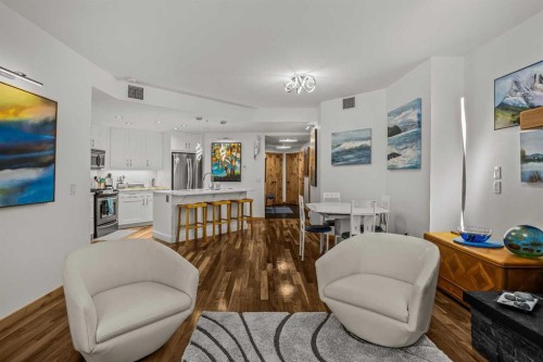 205-600 Spring Creek Drive, Canmore, AB - Indoor Photo Showing Living Room