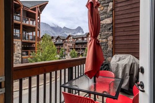 205-600 Spring Creek Drive, Canmore, AB - Outdoor With Balcony With Exterior
