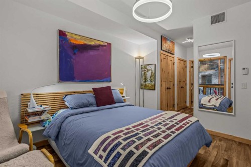 205-600 Spring Creek Drive, Canmore, AB - Indoor Photo Showing Bedroom