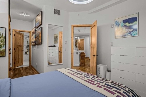 205-600 Spring Creek Drive, Canmore, AB - Indoor Photo Showing Bedroom