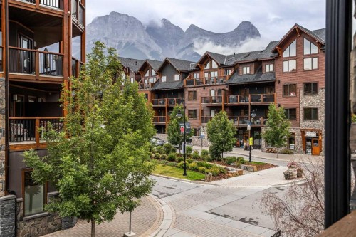 205-600 Spring Creek Drive, Canmore, AB - Outdoor With Balcony With Facade