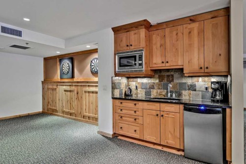 205-600 Spring Creek Drive, Canmore, AB - Indoor Photo Showing Kitchen