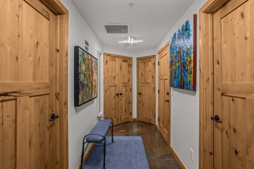 205-600 Spring Creek Drive, Canmore, AB - Indoor Photo Showing Other Room