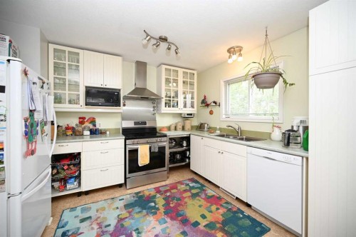 3113 47 Avenue, Athabasca, AB - Indoor Photo Showing Kitchen With Double Sink