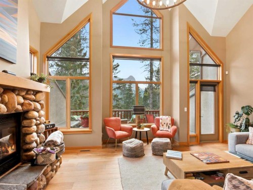 11-137 Wapiti Close, Canmore, AB - Indoor Photo Showing Living Room With Fireplace