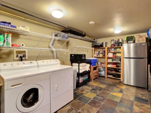 11-137 Wapiti Close, Canmore, AB - Indoor Photo Showing Laundry Room