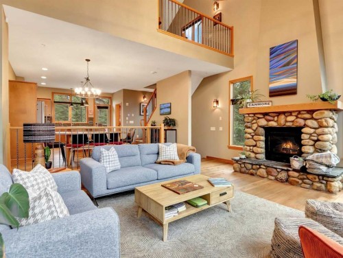 11-137 Wapiti Close, Canmore, AB - Indoor Photo Showing Living Room With Fireplace