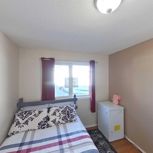 28 Centennial Crescent, Swan Hills, AB - Indoor Photo Showing Bedroom