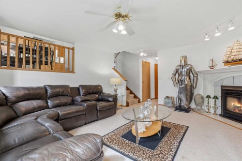 46 Atkinson Crescent, Whitecourt, AB - Indoor Photo Showing Living Room With Fireplace