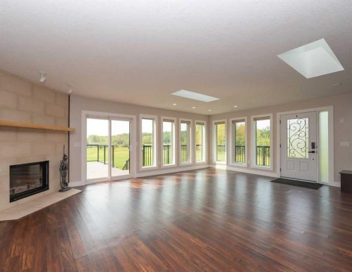 655059 Highway 813, Rural Athabasca County, AB - Indoor Photo Showing Living Room With Fireplace