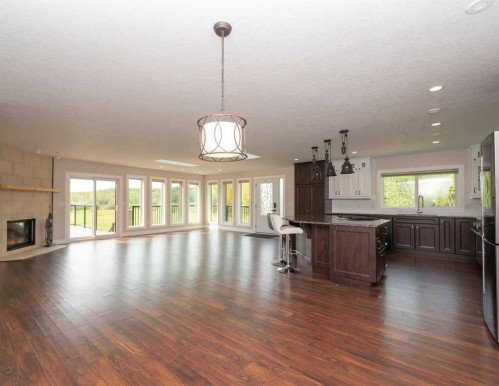 655059 Highway 813, Rural Athabasca County, AB - Indoor Photo Showing Living Room With Fireplace