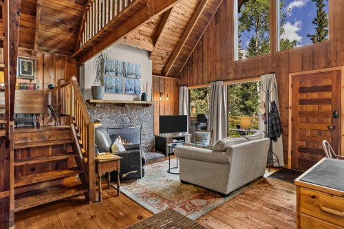 10 Heart Road, Lac Des Arcs, AB - Indoor With Fireplace