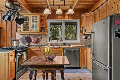 10 Heart Road, Lac Des Arcs, AB - Indoor Photo Showing Kitchen With Double Sink