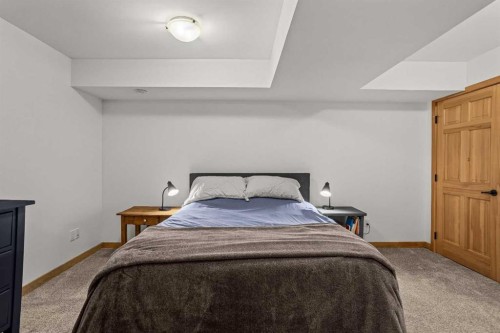 10 Heart Road, Lac Des Arcs, AB - Indoor Photo Showing Bedroom