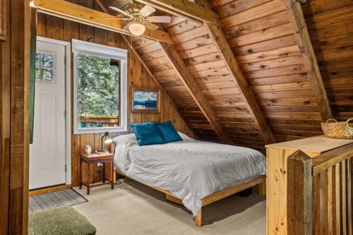 10 Heart Road, Lac Des Arcs, AB - Indoor Photo Showing Bedroom