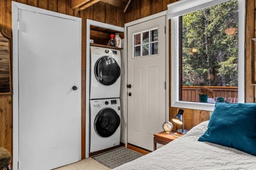 10 Heart Road, Lac Des Arcs, AB - Indoor Photo Showing Laundry Room