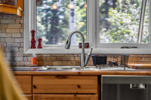 10 Heart Road, Lac Des Arcs, AB - Indoor Photo Showing Kitchen With Double Sink