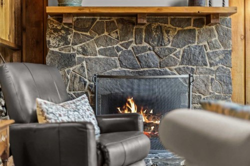 10 Heart Road, Lac Des Arcs, AB - Indoor With Fireplace