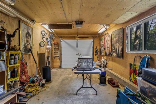 10 Heart Road, Lac Des Arcs, AB - Indoor Photo Showing Garage