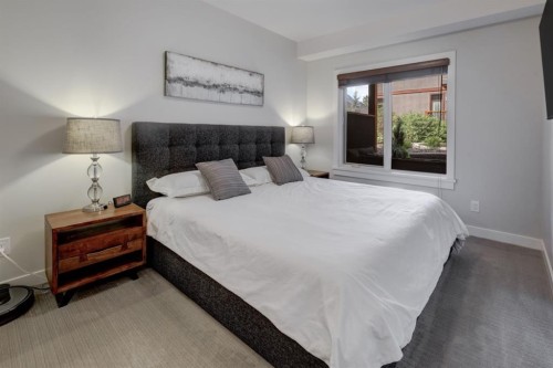 107-707 Spring Creek Drive, Canmore, AB - Indoor Photo Showing Bedroom
