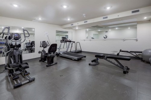 107-707 Spring Creek Drive, Canmore, AB - Indoor Photo Showing Gym Room