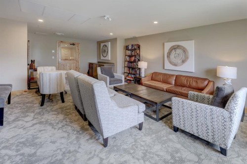107-707 Spring Creek Drive, Canmore, AB - Indoor Photo Showing Living Room