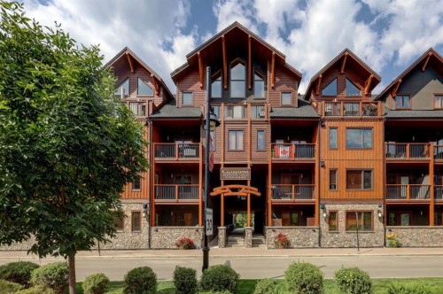107-707 Spring Creek Drive, Canmore, AB - Outdoor With Facade