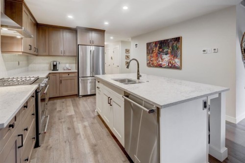 107-707 Spring Creek Drive, Canmore, AB - Indoor Photo Showing Kitchen With Double Sink With Upgraded Kitchen