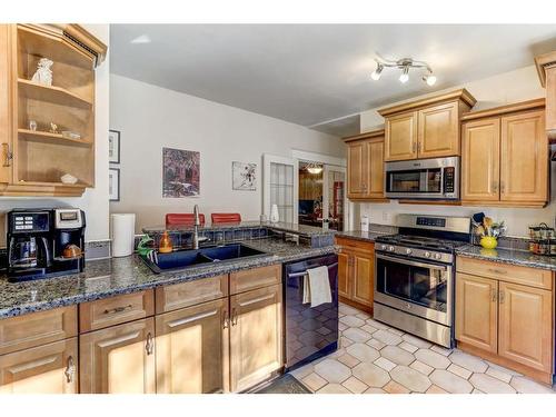 210 1 Street West, Drumheller, AB - Indoor Photo Showing Kitchen With Double Sink