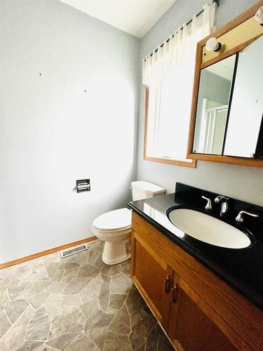 211 7 Avenue East, Oyen, AB - Indoor Photo Showing Bathroom