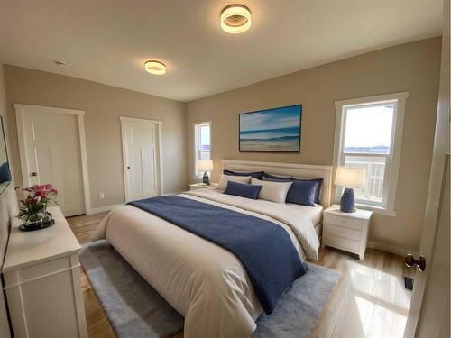 121 Upland Boulevard West, Brooks, AB - Indoor Photo Showing Bedroom