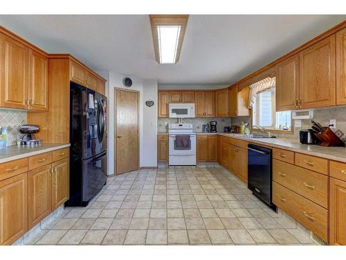 221 13 Street Nw, Drumheller, AB - Indoor Photo Showing Kitchen With Double Sink