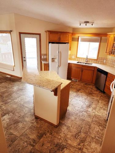 59 Upland Place, Brooks, AB - Indoor Photo Showing Kitchen With Double Sink