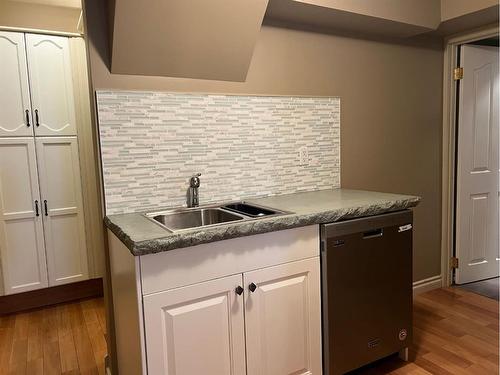 Unit 1-360 4 Street West, Drumheller, AB - Indoor Photo Showing Kitchen With Double Sink