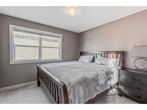117 Seagreen Manor, Chestermere, AB - Indoor Photo Showing Bedroom