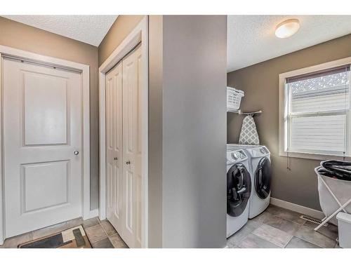 117 Seagreen Manor, Chestermere, AB - Indoor Photo Showing Laundry Room