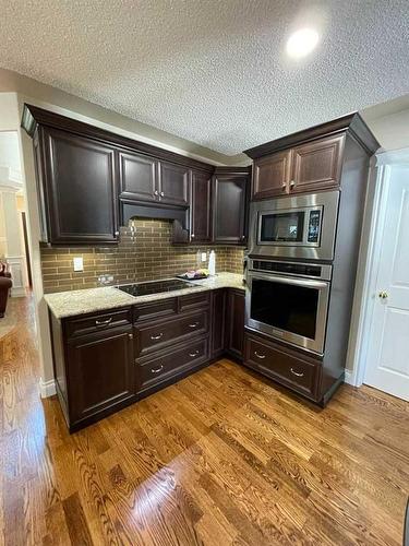 24 Evergreen Park Close West, Brooks, AB - Indoor Photo Showing Kitchen With Upgraded Kitchen