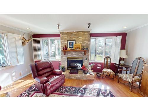 525 8 Avenue, Bassano, AB - Indoor Photo Showing Living Room With Fireplace